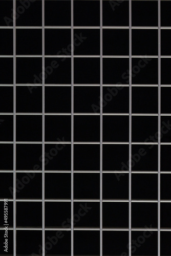 symmetric metal grid on black background