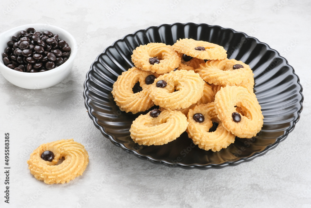 Vanilla Chips Cookies, served on black plate, copy space. Popular to celebrate Eid al Fitr. Selective focus image.
