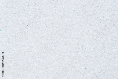 A sheet of white recycled cardboard texture as background