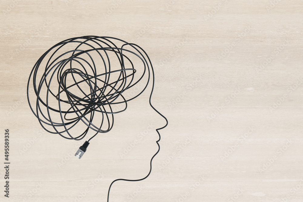 Abstract head and brain scribble outline made of usb cable on wooden background with mock up place. Anxiety and power concept. 3D Rendering. Abstract head and brain scribble outline made of usb cable on wooden background with mock up place. Anxiety and power concept. 3D Rendering.