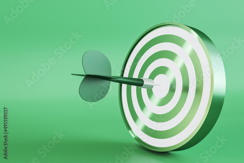 Creative bullseye target with arrow on green background with mock up place. Targeting and marketing concept. 3D Rendering. © Who is Danny