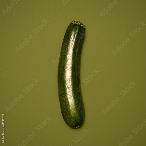 Thick green and juicy. Shot of a green marrow against a studio background.