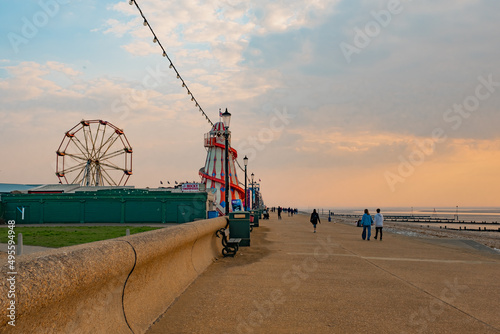 A view down the promenade or esplanade at sunset in the seaside town of Hunstanton on the North Norfolk coast