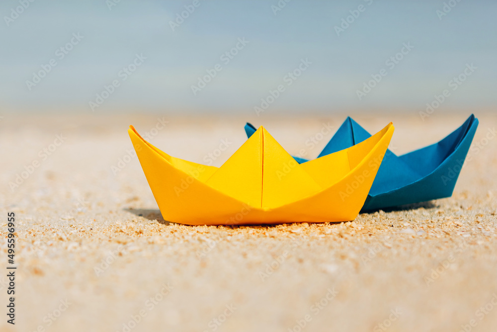 colorful paper boats at the tropical beach colorful paper boats at the tropical beach