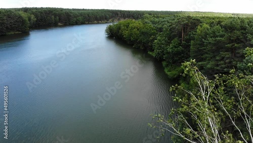 Aerial view. Lake and green forest in Tuchola National Park, Poland. Summer landscape in Europe. Perfect place for relaxing in nature.