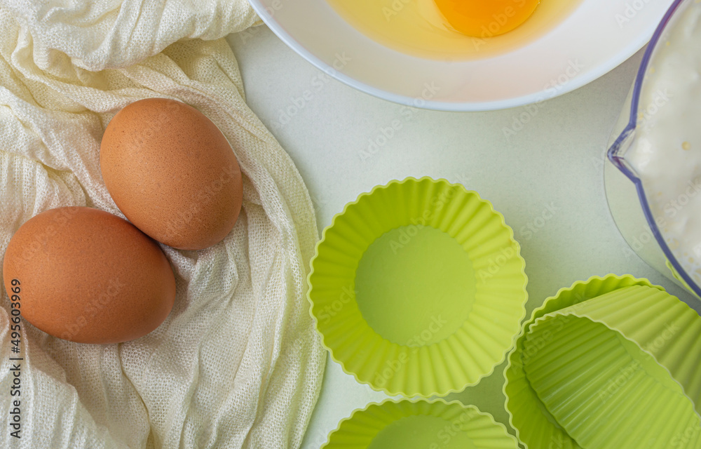 eggs and muffin baking pans top view eggs and muffin baking pans top view