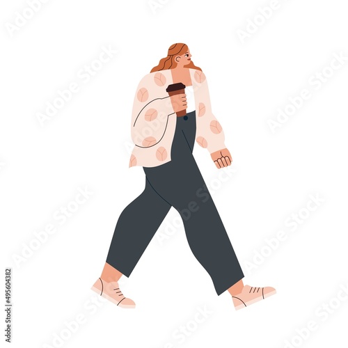 Young woman walking with takeaway coffee cup outdoors. Modern person with hot...