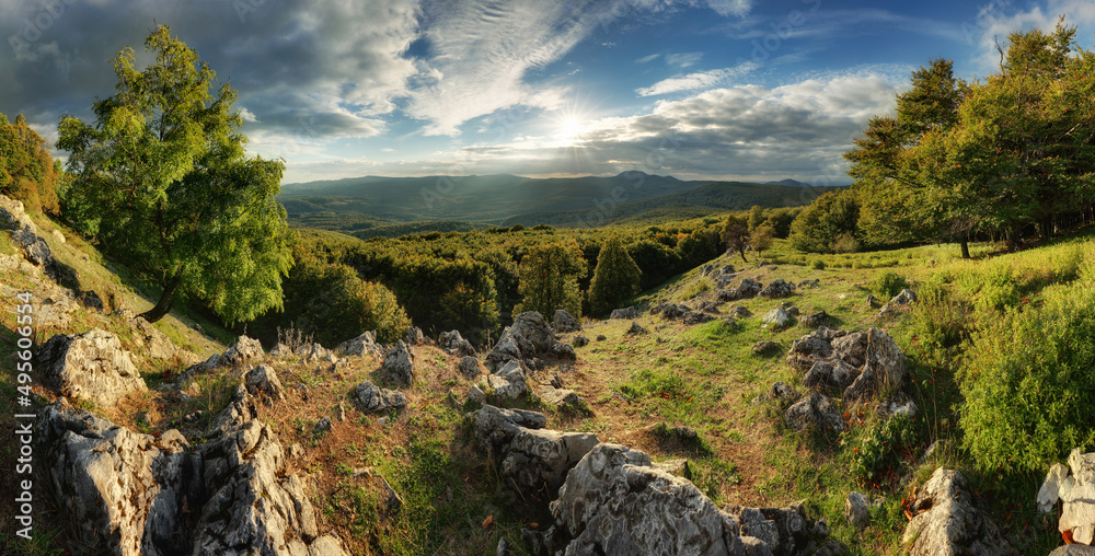 Carpathian green mountain with sun