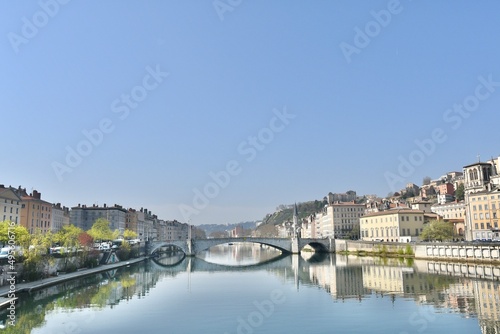 Beautiful city of lyon and its bonaparte bridge over the river Sâone on a spring morning © nic