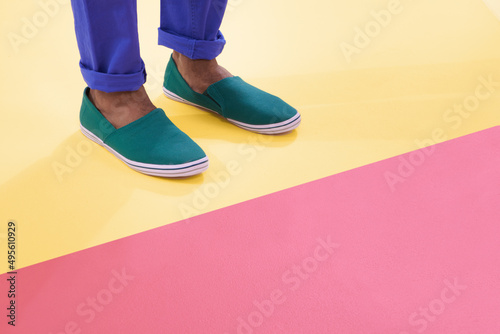 Colours and footwear. Cropped shot of footwear on a colourful background.