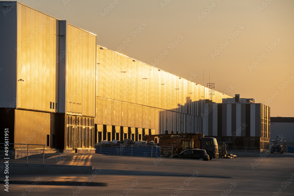 Modern warehouse at sunset