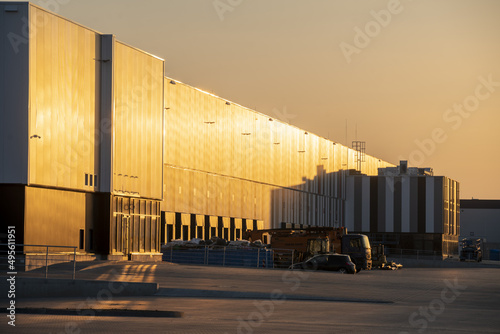 Modern warehouse at sunset