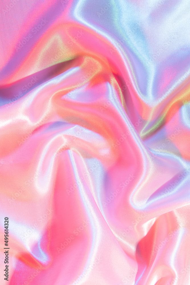 Fototapeta premium Light bright pink abstract texture. iridescent surface wrinkled silk background