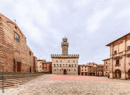 The central square Piazza Grande with Palazzo Comunale (Town Hall) in a Renaissance hill town Montepulciano, Italy photo