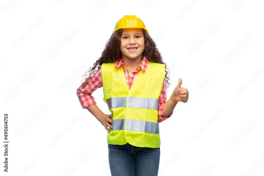 building, construction and profession concept - smiling little girl in protective helmet and safety vest showing thumbs up over white background building, construction and profession concept - smiling little girl in protective helmet and safety vest showing thumbs up over white background