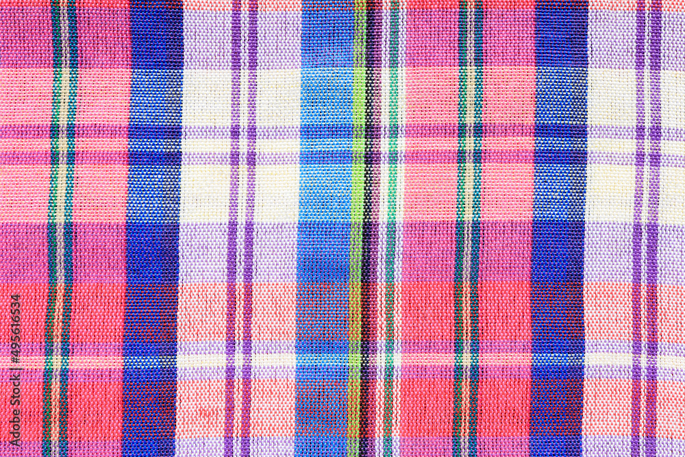 Colorful thai loincloth pattern as background. bright plaid fabric of thailand. Colorful thai loincloth pattern as background. bright plaid fabric of thailand.