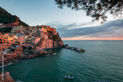 Fototapeta Naklejka Na Ścianę i Meble -  view of the town of manarola by the sea in italy at sunset