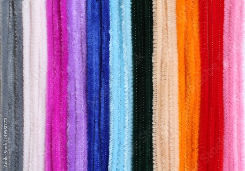 Background - colorful fluffy decorative wires, located close to each other