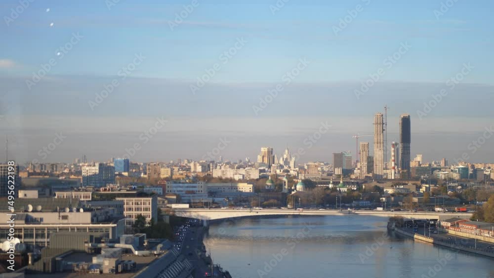 Beautiful view of the Moskva River and distant skyscrapers of a financial district Beautiful view of the Moskva River and distant skyscrapers of a financial district