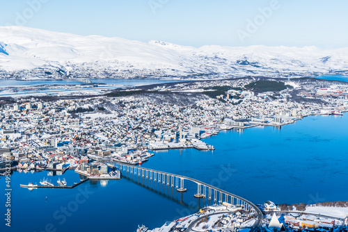 Incredible View to Tromso city in Norway from Storsteinen peak, a mountain ledge about 420 m (1378 ft) above sea-level
