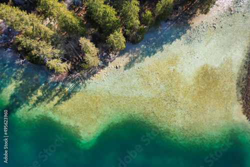 Fototapeta Naklejka Na Ścianę i Meble -  Beautiful green lake Hintersee Ramsau Berchtesgardner Land Alps birds eye view drone DJI Air 2s