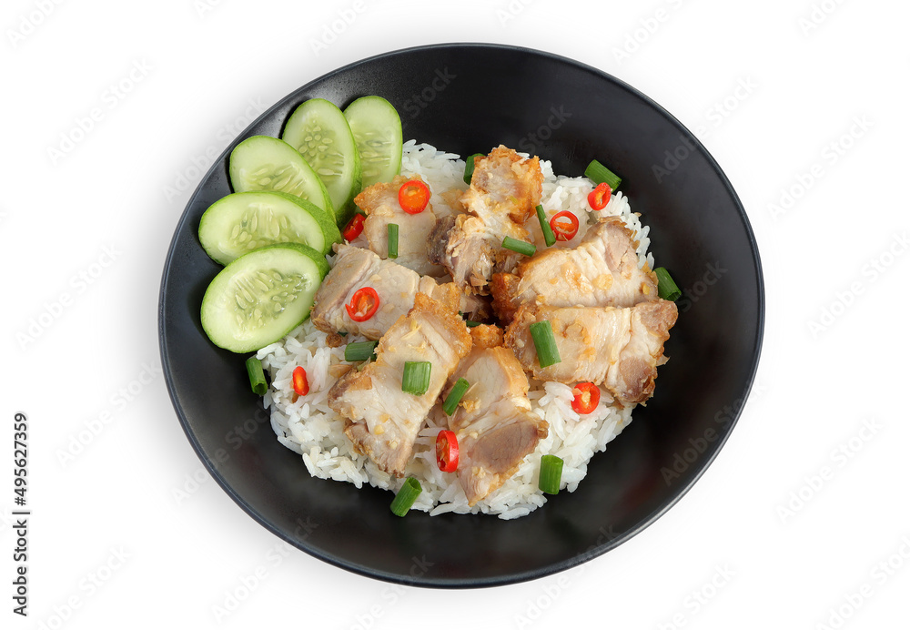 Close up of pork belly stirred fry with rice. homemade crispy belly pork and chilli topped rice. Thai local food style, top view.