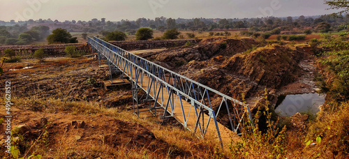 Bird's eye panoramic view of Kali dam, check dam on a sunny day in Dahod, Gujarat, India photo