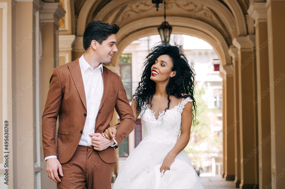 Luxurious wedding couple. Clear, even skin. Photo shoot outdoors with natural light. Portrait of a couple in love in wedding attire. Luxurious wedding couple. Clear, even skin. Photo shoot outdoors with natural light. Portrait of a couple in love in wedding attire.