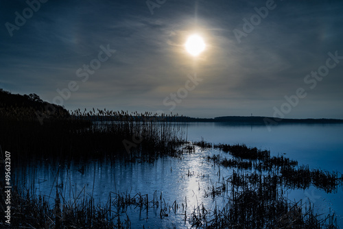 Obraz na plátně Scenic view of a lake at dawn with beautiful moonlight