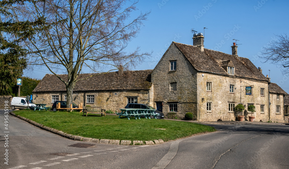 The Village Green and the Swan public house in Southrop, the Cotswolds, England, United Kingdom