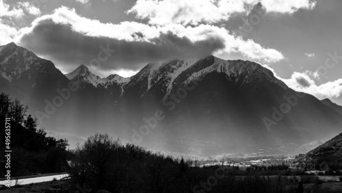Sun in Erymanthos mountains covered in fresh snow during winter months photo