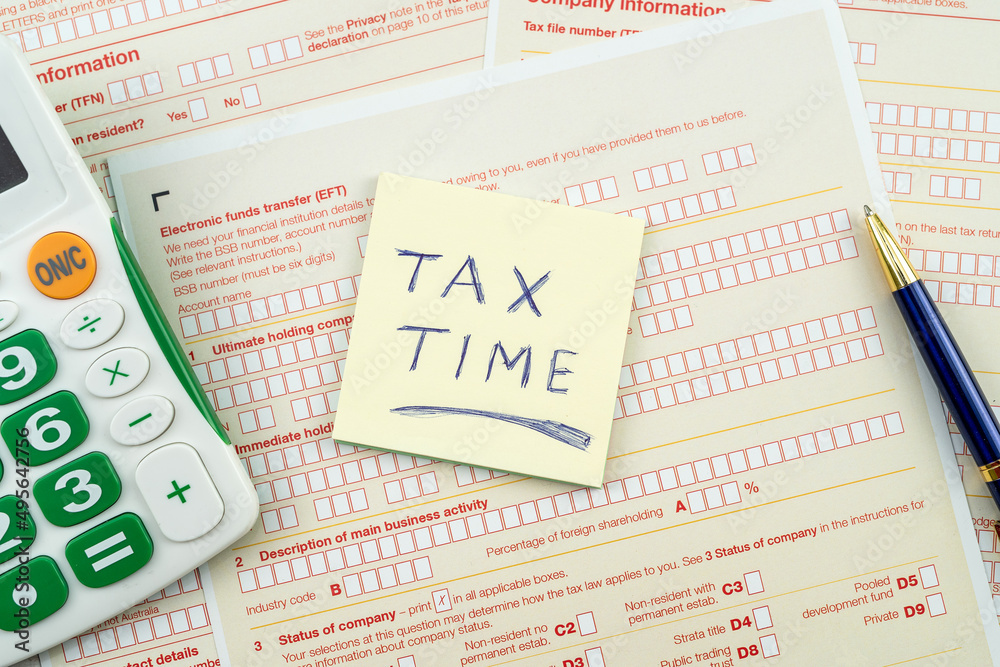 Obraz premium text tax time on australian tax form. accounting concept