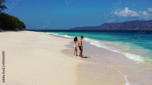 Lovely young couple spending time together in Gili Meno, Lombok, Indonesia