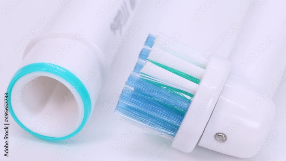 Rotating motion of used electric toothbrush heads, close up view in 4k, macro shot. Rotating motion of used electric toothbrush heads, close up view in 4k, macro shot.