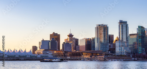 Panoramic View of Modern City Building Skyline on West Coast Pacific Ocean. Sunny Winter Sunrise. Stanley Park, Coal Harbour, Downtown Vancouver, British Columbia, Canada.