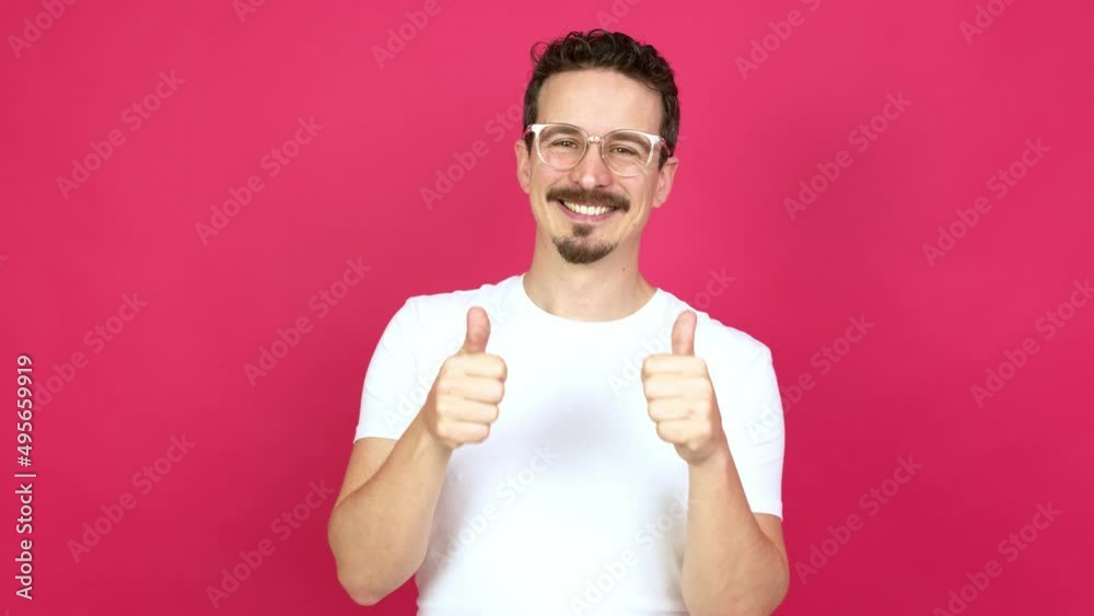 Man with glasses and with thumbs up Man with glasses and with thumbs up