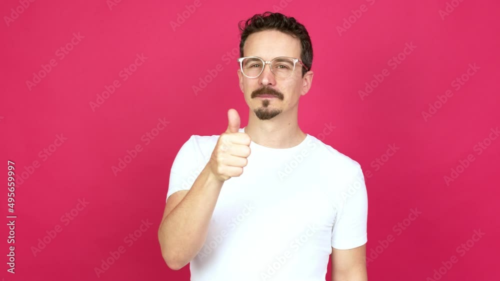 Man with glasses and with thumbs up Man with glasses and with thumbs up