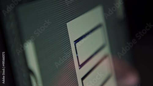 Freelancer, remote graphic designer draws on a computer prototype of a website, layout, app icon design for a smartphone, UI UX design. NFT product for sale on the exchange