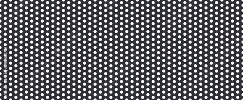 Metal mesh. Pattern of perforated metal. Black mesh texture. Perforated steel. Circle hole in steel plate. Iron sieve. Seamless background. Vector photo