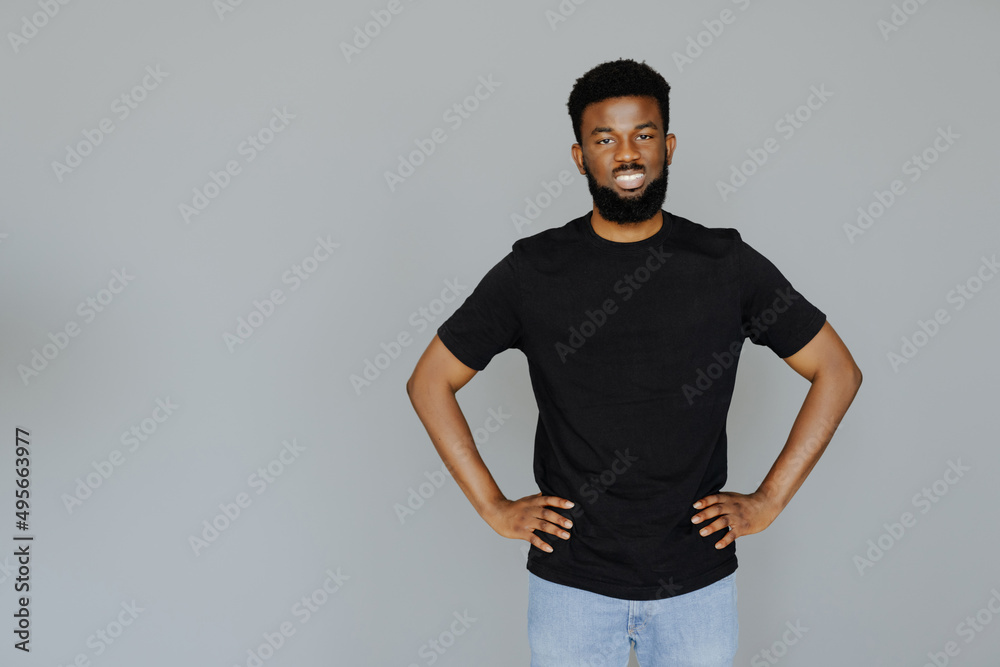 Portrait of handsome african man isolated on gray background Portrait of handsome african man isolated on gray background