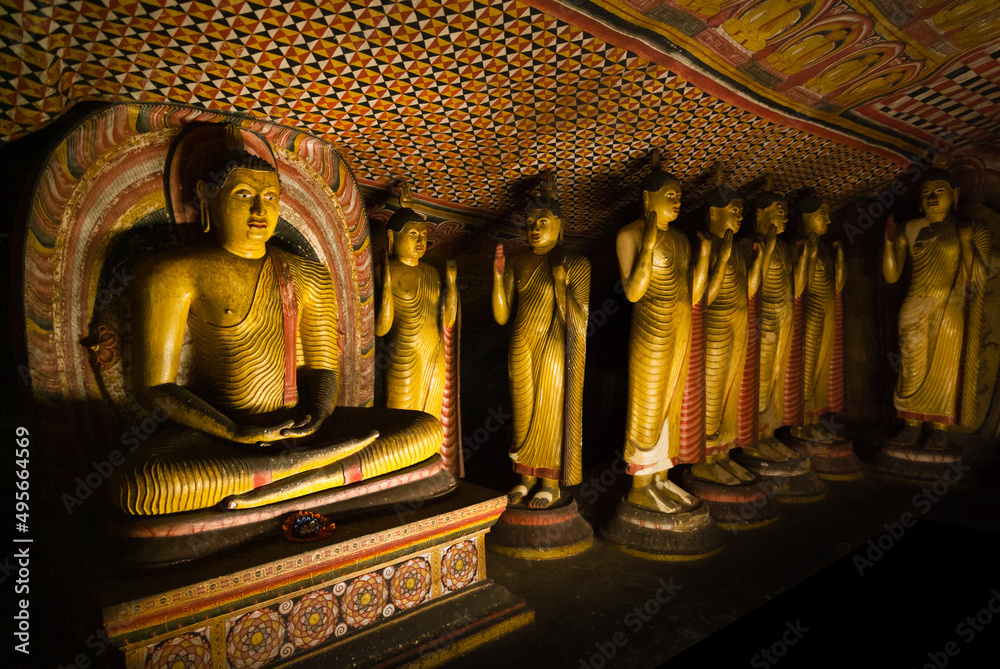 Fototapeta premium Buddha statues inside Dambulla cave teple complex