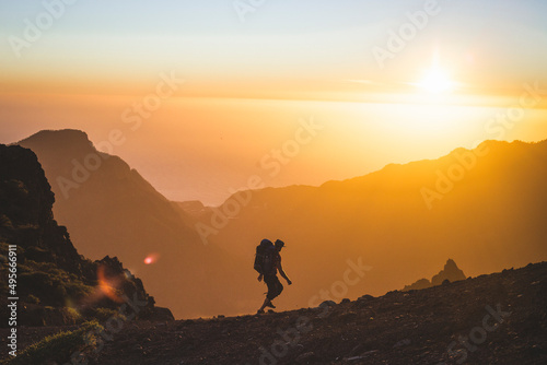 silhouette of a person on a mountain top © Kasia Czampiel