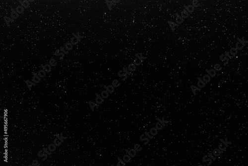 Textura fondo negro con piedritas brillante peque  as. Vista de cerca. macro
