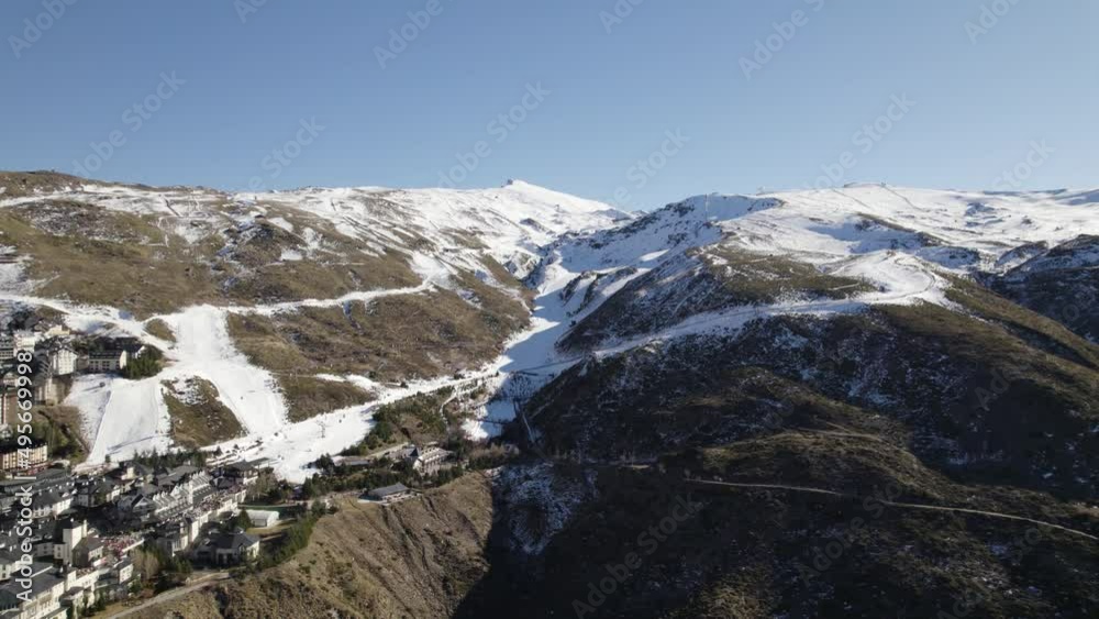 Steep snow covered slopes of Sierra Nevada ski resort, Granada, Spain Steep snow covered slopes of Sierra Nevada ski resort, Granada, Spain