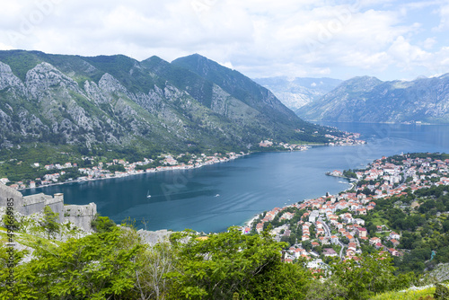 Cloudy sky over the Adriatic Sea canal and the Kotor bay in Montenegro in summer photo