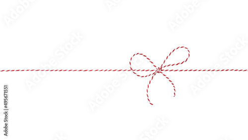 Red and white Christmas string tied in a bow isolated on white background