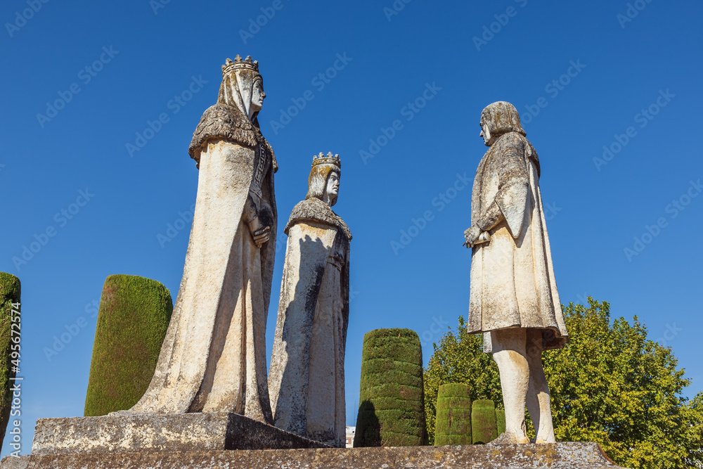 Statues of King Ferdinand, Queen Isabella and Christopher Columbus in the garden of the alcazar