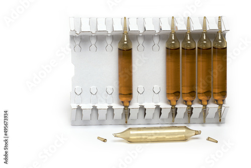 one open drinking ampoules doping white background