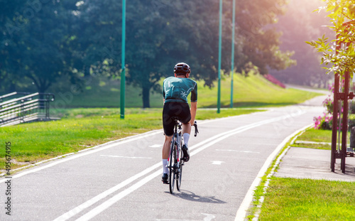 Cyclist ride on the bike path in the city Park 