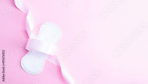 Feminine hygiene menstrual pads. Menstruation napkin for woman hygiene on pink background. Menstruation feminine period. Menstruation, critical days, zero waste, eco, ecology banner.